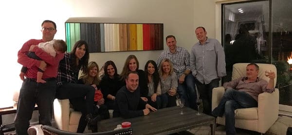 friendsgiving photo friends in front of sofa