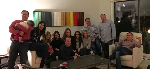 friendsgiving photo friends in front of sofa