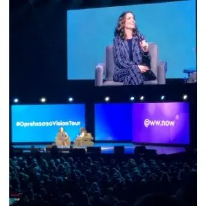 tina fey speaking at the xcel energy center on the oprah 2020 wellness tour your life in focus