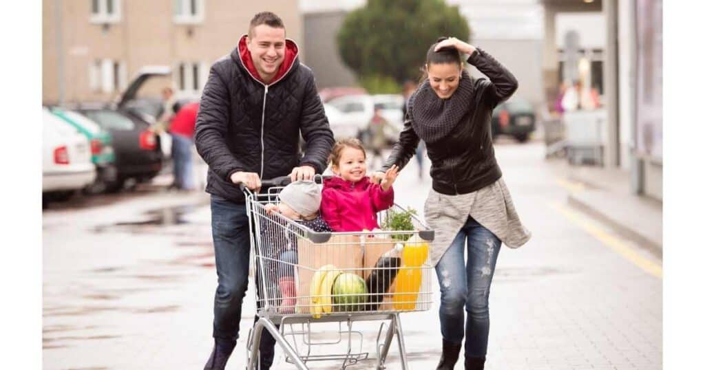 couple pushing groceries