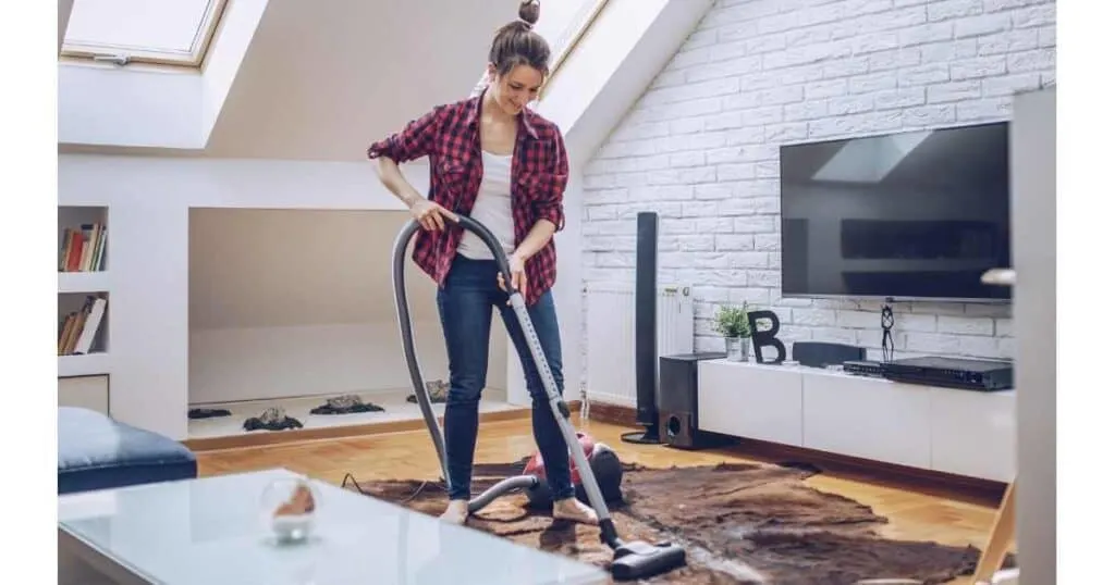 woman vacuuming 