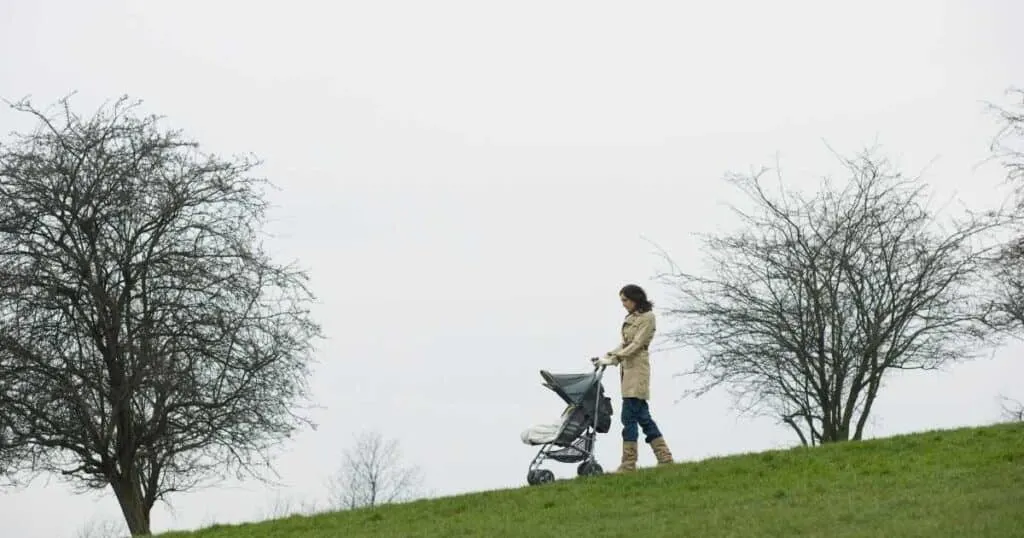 woman pushing stroller