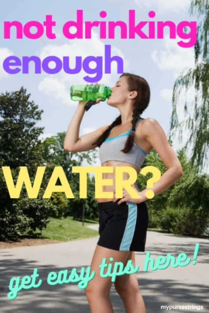 girl drinking water on road