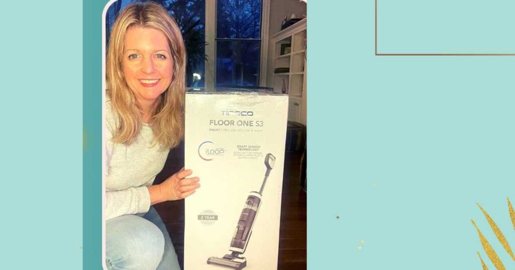 Michelle Platt sitting next to Tineco Vacuum Mop box