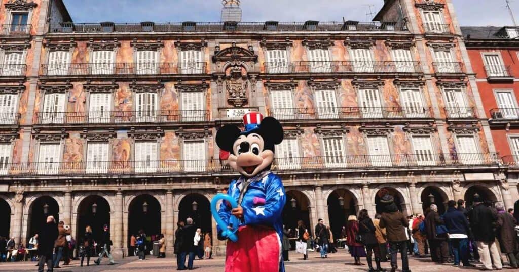 mickey mouse holding balloon