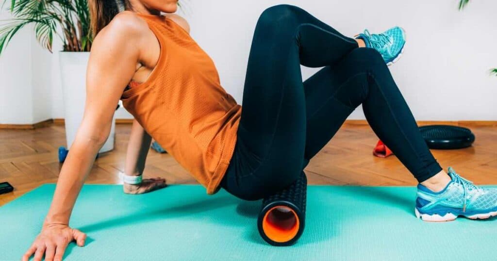 woman foam rolling