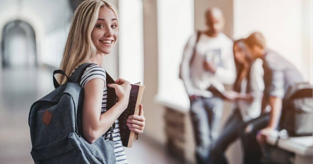 blonde college girl with backpack