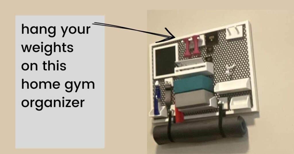 wall organizer holds dumbbells