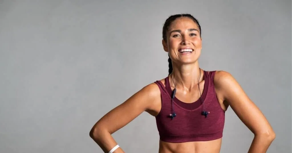 proud woman in sports bra