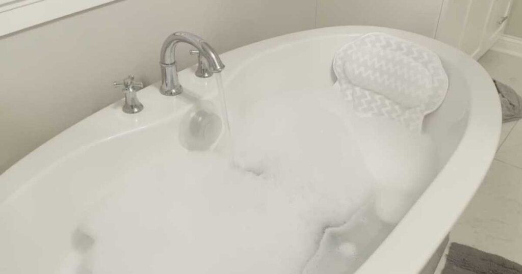 bath pillow in bubble bath