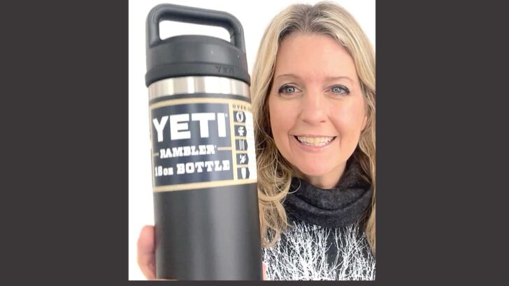 woman smiling holding yeti water bottle rambler 18 oz