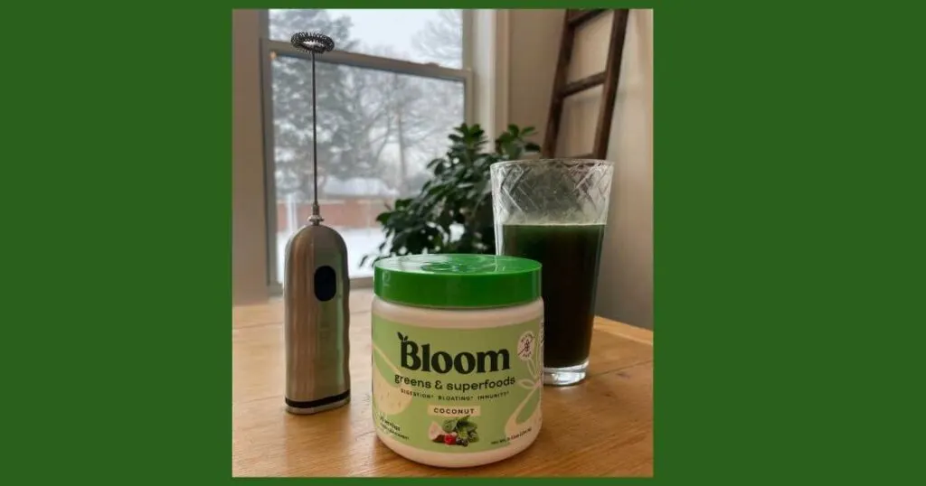 bloom powdered greens, glass of green juice, and milk frother