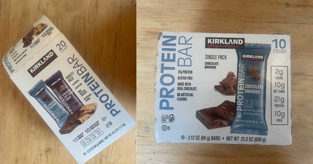 boxes of Kirkland protein bars against wooden table