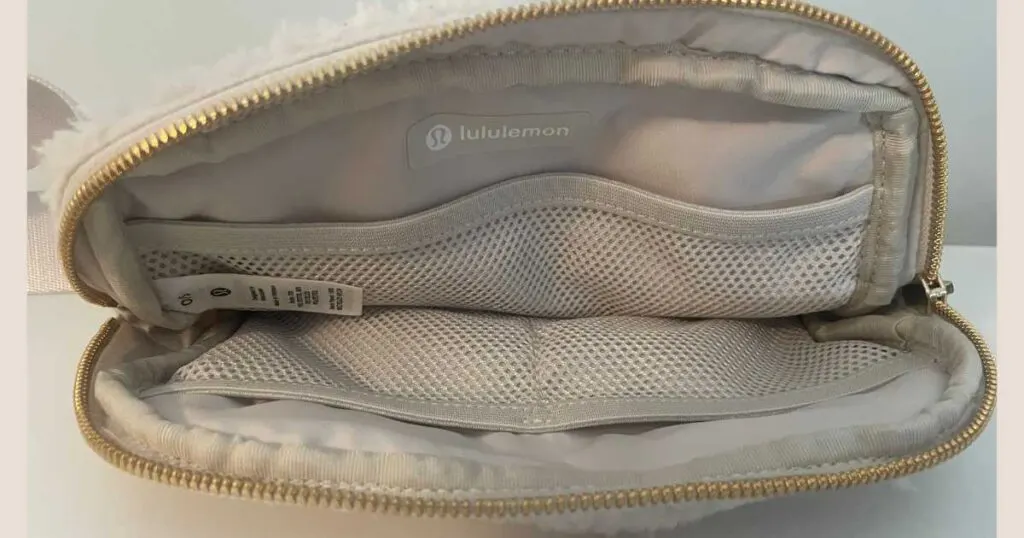 inside of lululemon belt bag mesh compartments and zipper