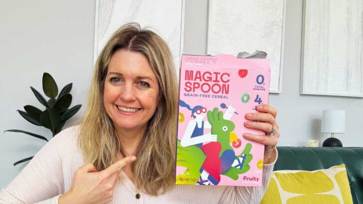 Michelle Platt holding a box of fruity flavor Magic Spoon cereal.