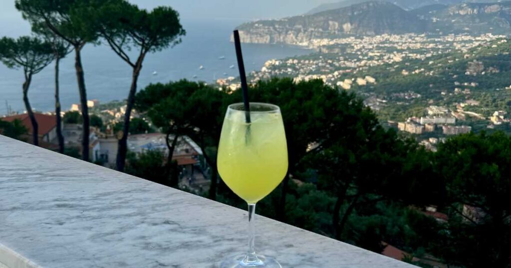 Glass of Limoncello overlooking Sorrento.